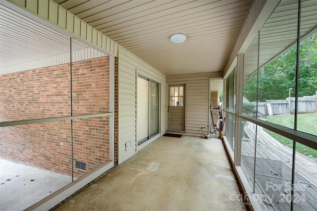 unfurnished sunroom with a healthy amount of sunlight