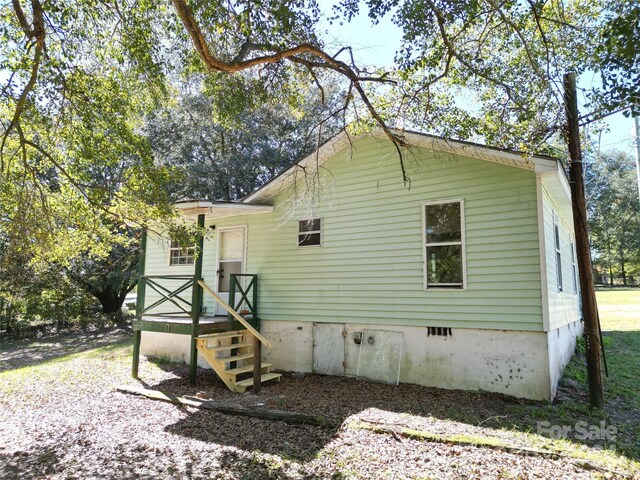 521 Short St Unit 8, Morven, NC 28119 - rear view of house featuring crawl space