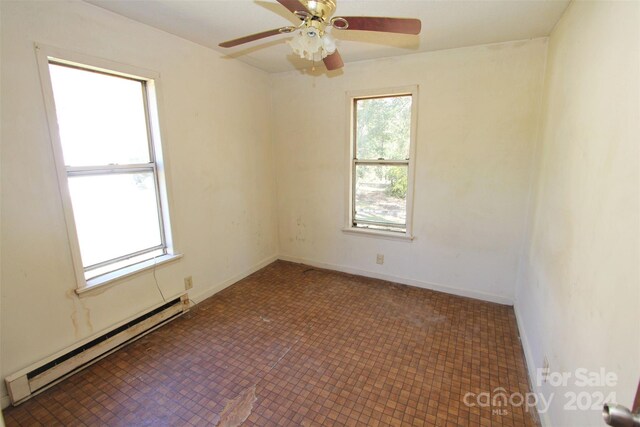 521 Short St Unit 8, Morven, NC 28119 - unfurnished room with a baseboard radiator, ceiling fan, and baseboards