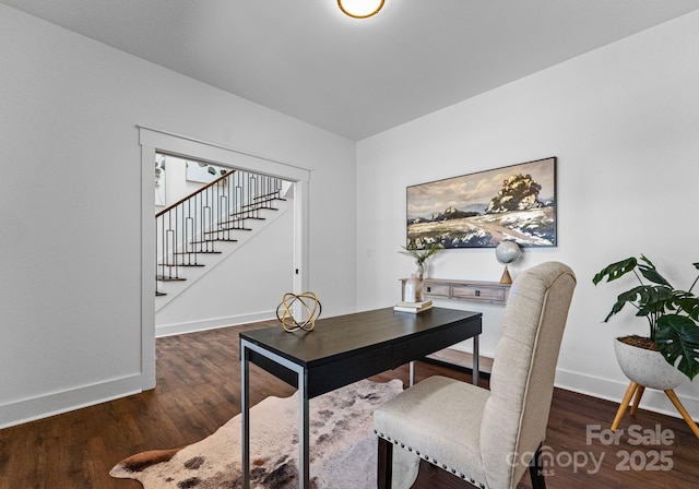 office space with dark hardwood / wood-style flooring