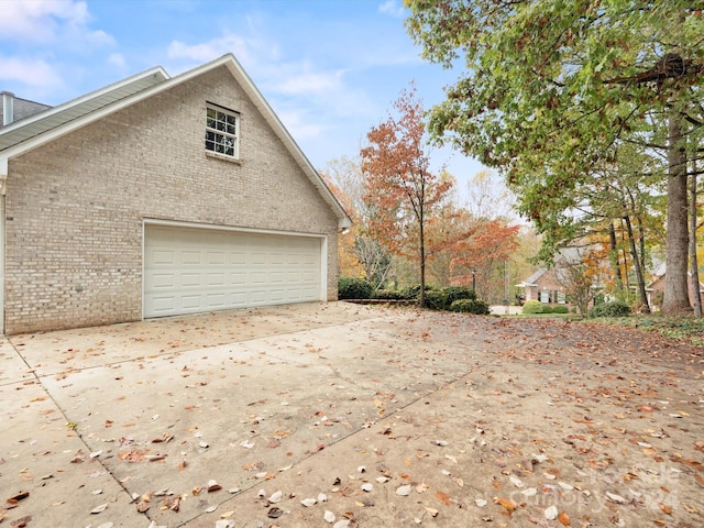 view of home's exterior featuring a garage