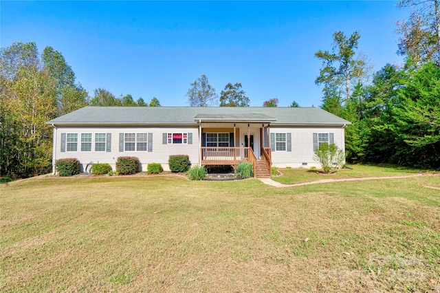 ranch-style house with a front lawn