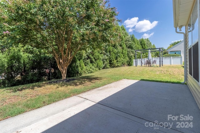 view of yard featuring a patio area and a pergola