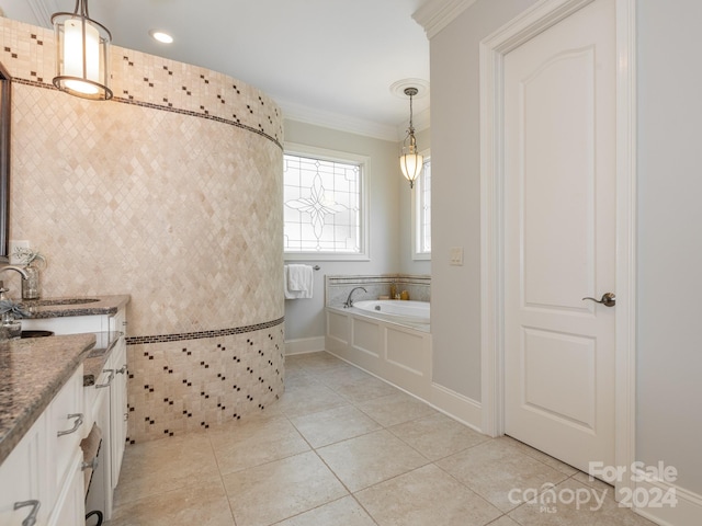 bathroom with vanity, ornamental molding, a bathtub, and tile patterned flooring