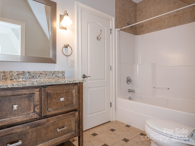 full bathroom with vanity, toilet, tile patterned floors, and washtub / shower combination