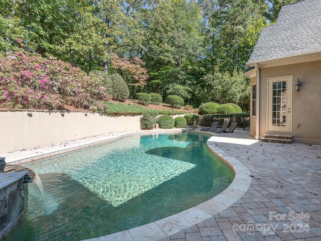 view of pool with a patio