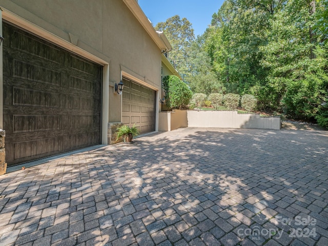 view of patio with a garage