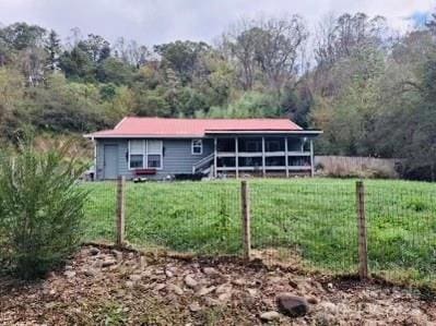 view of front of property with a front lawn