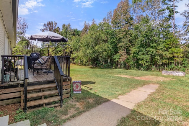 view of yard featuring a deck