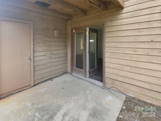 entrance to property with a patio area