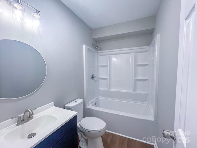 508 Deese St, Monroe, NC 28112 - bathroom with vanity, wood finished floors, and shower / bathtub combination