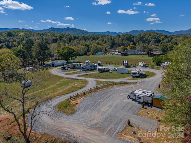 drone / aerial view featuring a mountain view