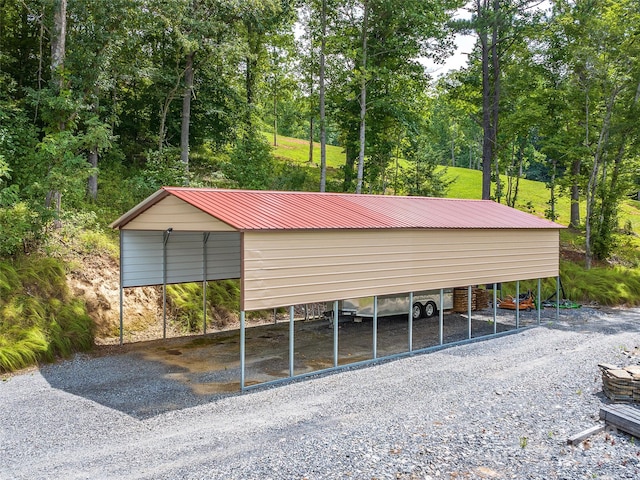 exterior space with a carport