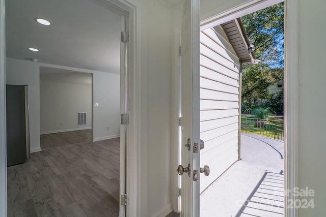 doorway featuring hardwood / wood-style flooring