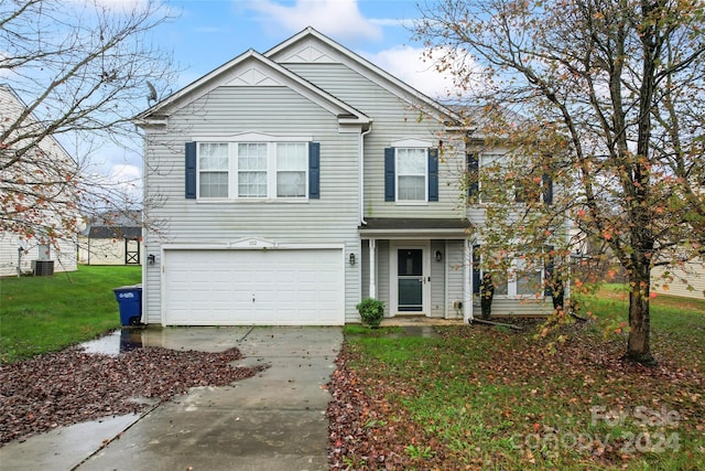 view of property with central AC, a garage, and a front lawn