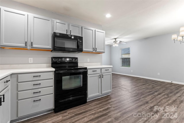 kitchen with gray cabinetry, ceiling fan, dark wood-type flooring, and black appliances