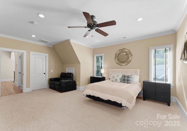 carpeted bedroom with ceiling fan and crown molding