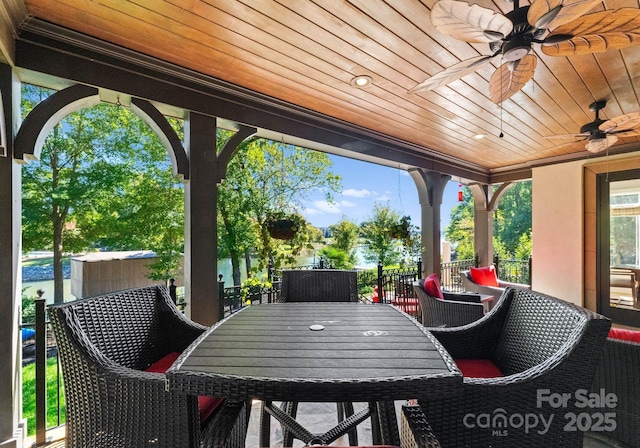 view of patio featuring ceiling fan