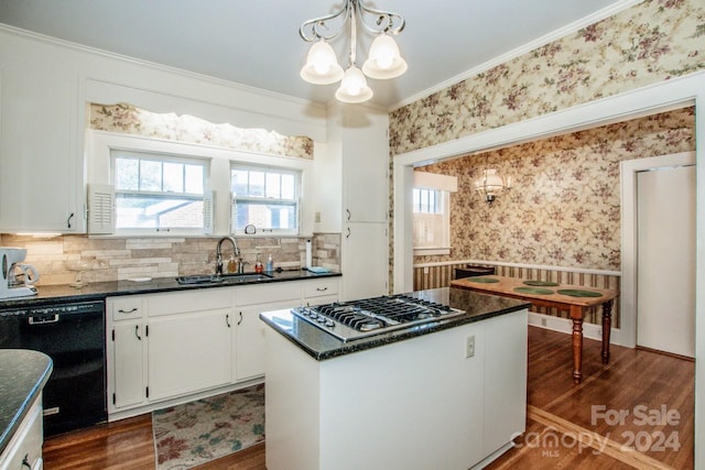 kitchen featuring sink, dishwasher, stainless steel gas cooktop, decorative light fixtures, and white cabinets