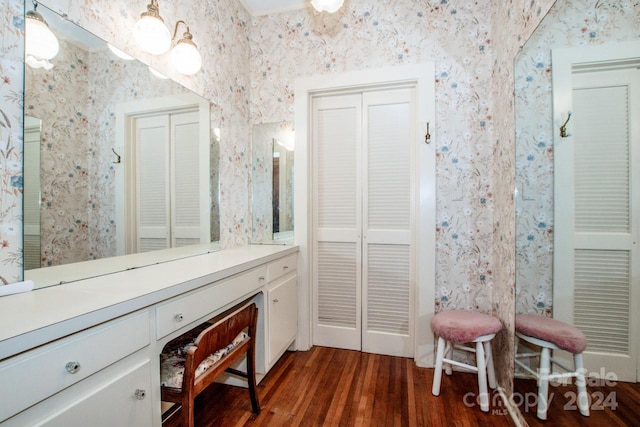 bathroom with vanity and hardwood / wood-style floors