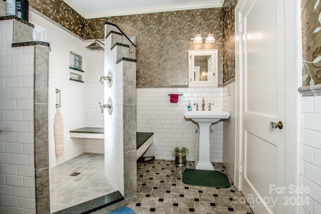 bathroom with crown molding, tile walls, and tiled shower