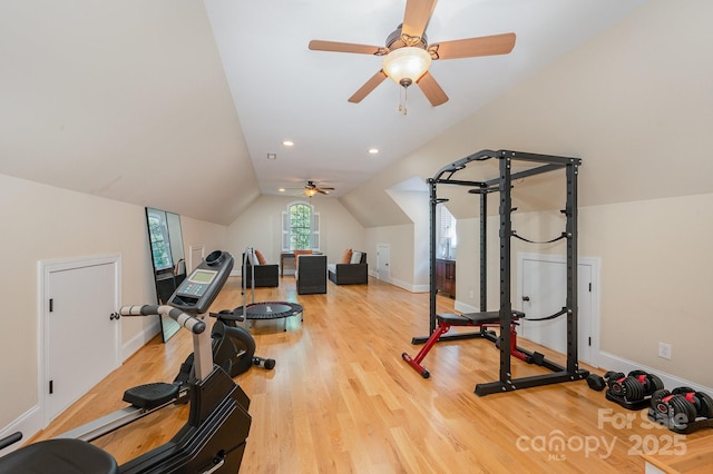 workout area with lofted ceiling, baseboards, wood finished floors, and recessed lighting