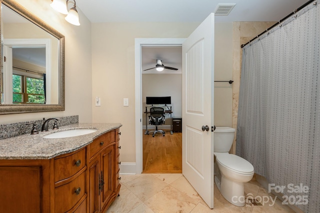 bathroom featuring visible vents, a shower with shower curtain, toilet, vanity, and tile patterned flooring