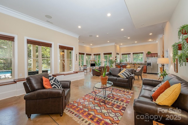 living room with concrete flooring, recessed lighting, and crown molding