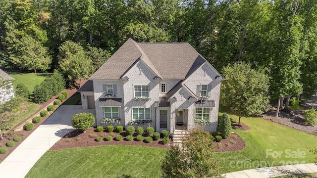 view of front of home with a front yard