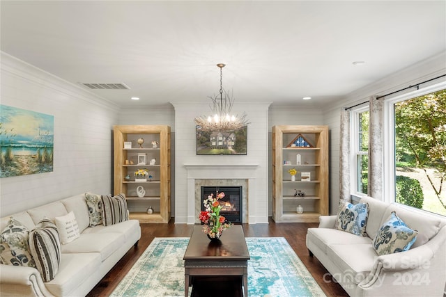 living room featuring a chandelier and dark hardwood / wood-style floors