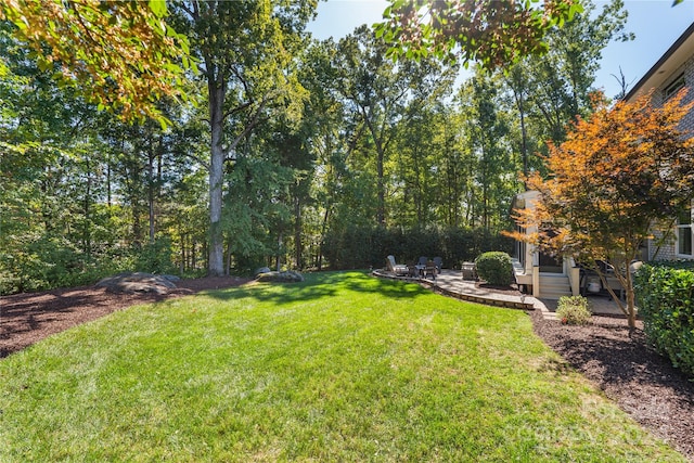 view of yard with a deck