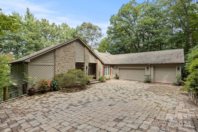 view of front of property featuring a garage