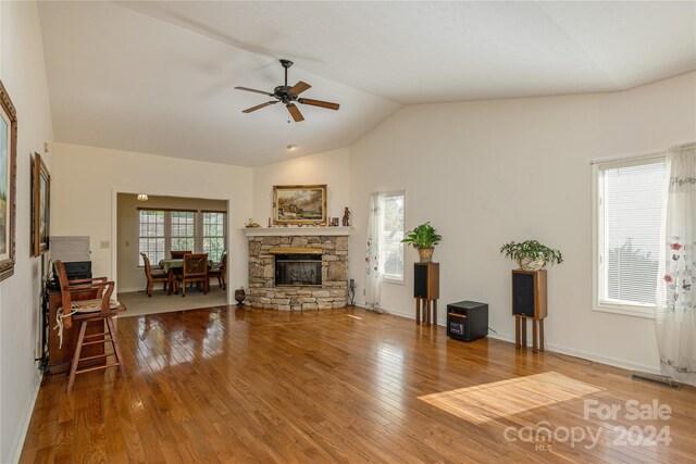 3 Country Meadows Ln, Hendersonville, NC 28792 - living room featuring lofted ceiling, a ceiling fan, a fireplace, and wood-type flooring