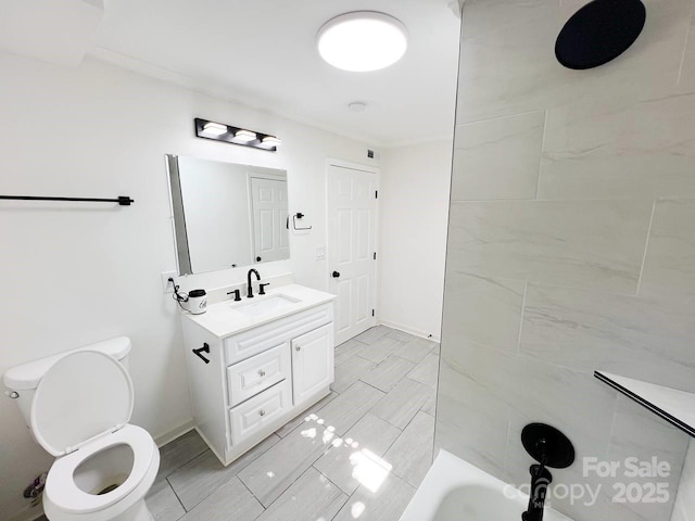 bathroom with toilet and vanity