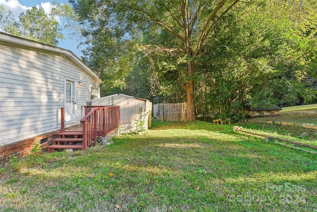 view of yard featuring a deck