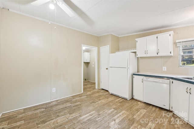 kitchen with light hardwood / wood-style floors, crown molding, white cabinetry, and white appliances