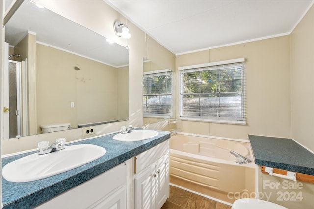 full bathroom featuring vanity, toilet, ornamental molding, and plus walk in shower