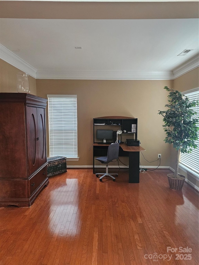 office with crown molding and hardwood / wood-style floors