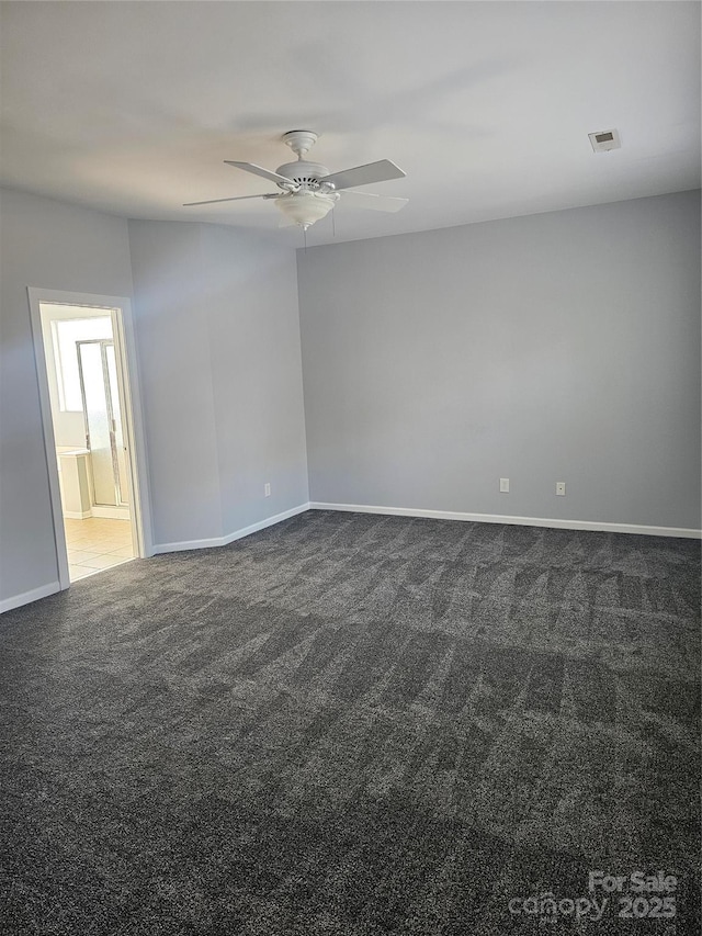 carpeted empty room with ceiling fan