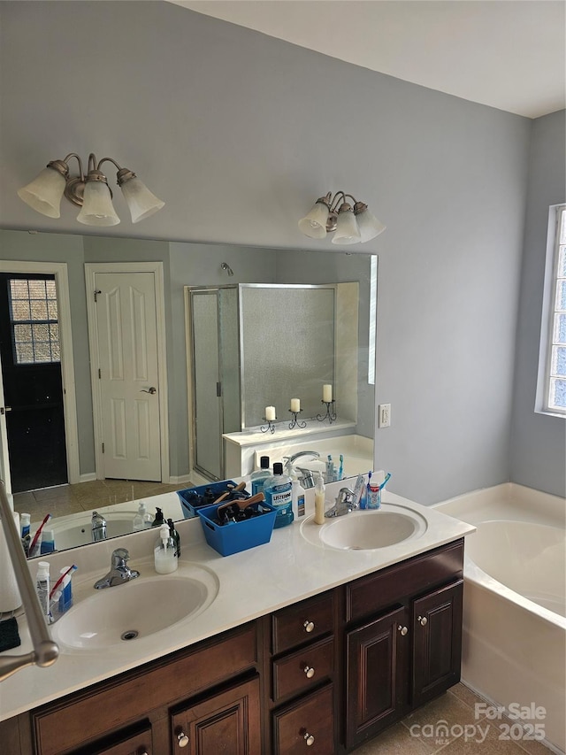 bathroom with separate shower and tub, vanity, and tile patterned floors