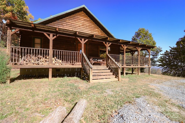 view of log-style house