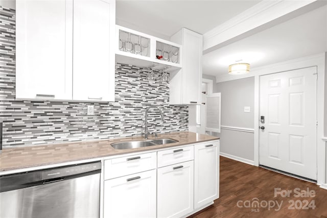 kitchen with dishwasher, white cabinets, sink, tasteful backsplash, and dark hardwood / wood-style flooring