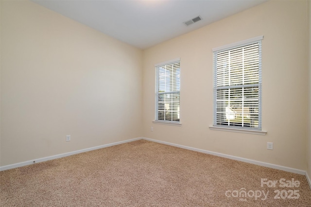 view of carpeted spare room