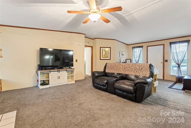 living room with crown molding, carpet flooring, vaulted ceiling, and ceiling fan