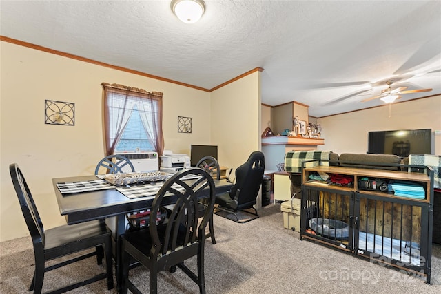 carpeted dining area featuring crown molding, a textured ceiling, vaulted ceiling, and ceiling fan