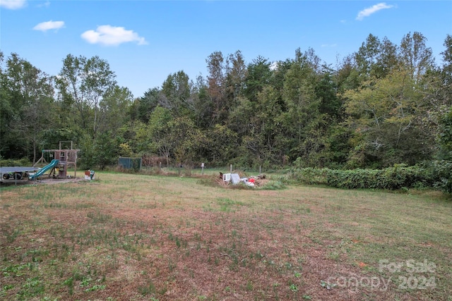 view of yard featuring a playground