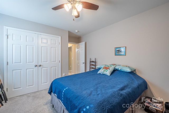 bedroom with carpet flooring, a closet, and ceiling fan