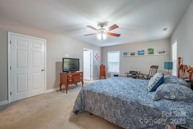 bedroom featuring visible vents, ceiling fan, baseboards, and carpet