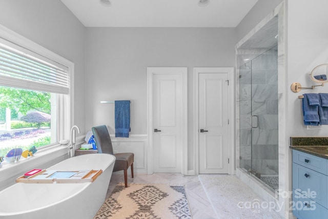 18212 Pompano Pl, Cornelius, NC 28031 - full bath featuring a stall shower, a soaking tub, and vanity