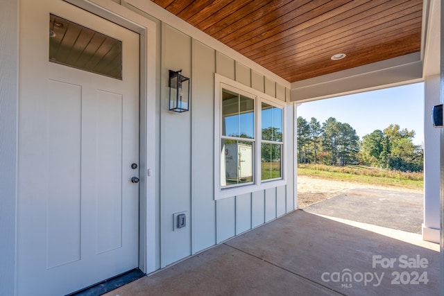 entrance to property with a patio area